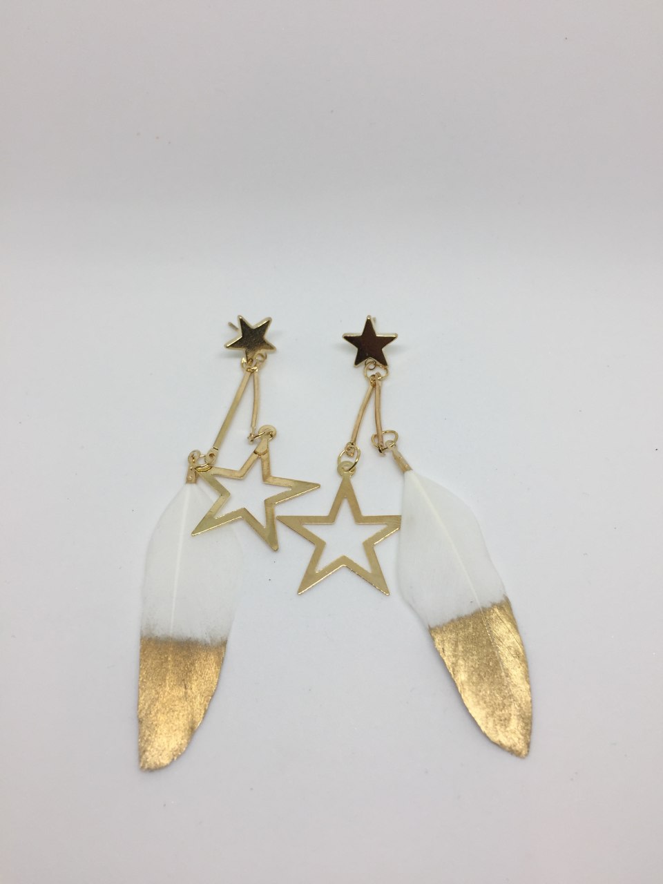 Feather star earrings