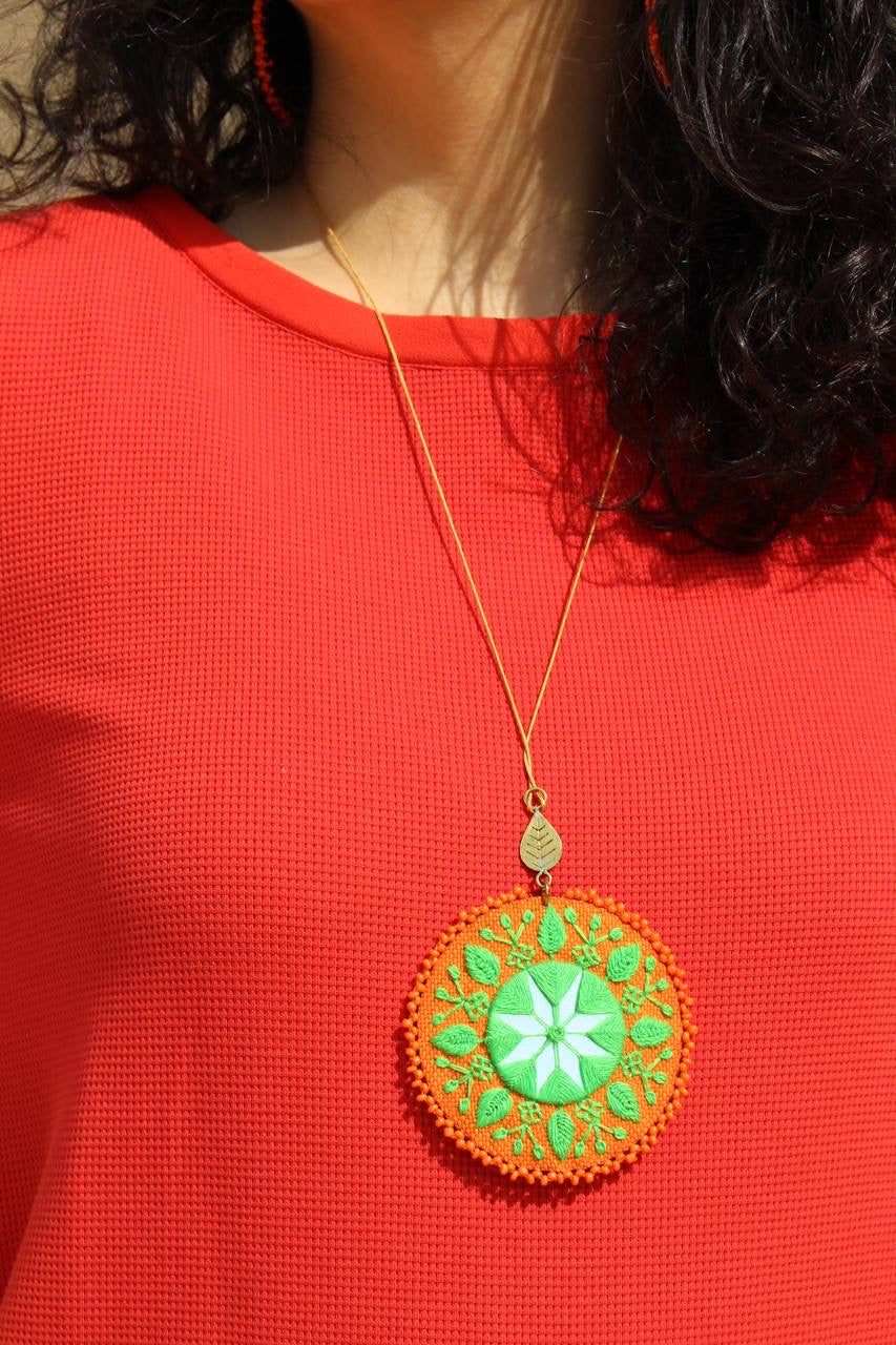 Handmade Embroidered Circular Necklace With Green and Orange Thread