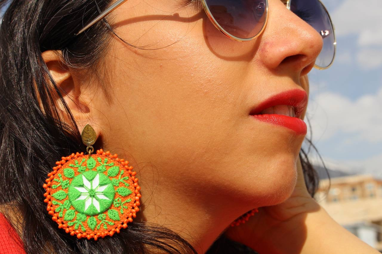 Handmade Embroidered Circular Earrings With Greean And Orange Thread