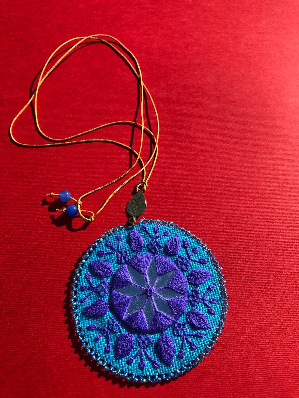 Handmade Embroidered Circular Necklace With Blue and Purple Thread