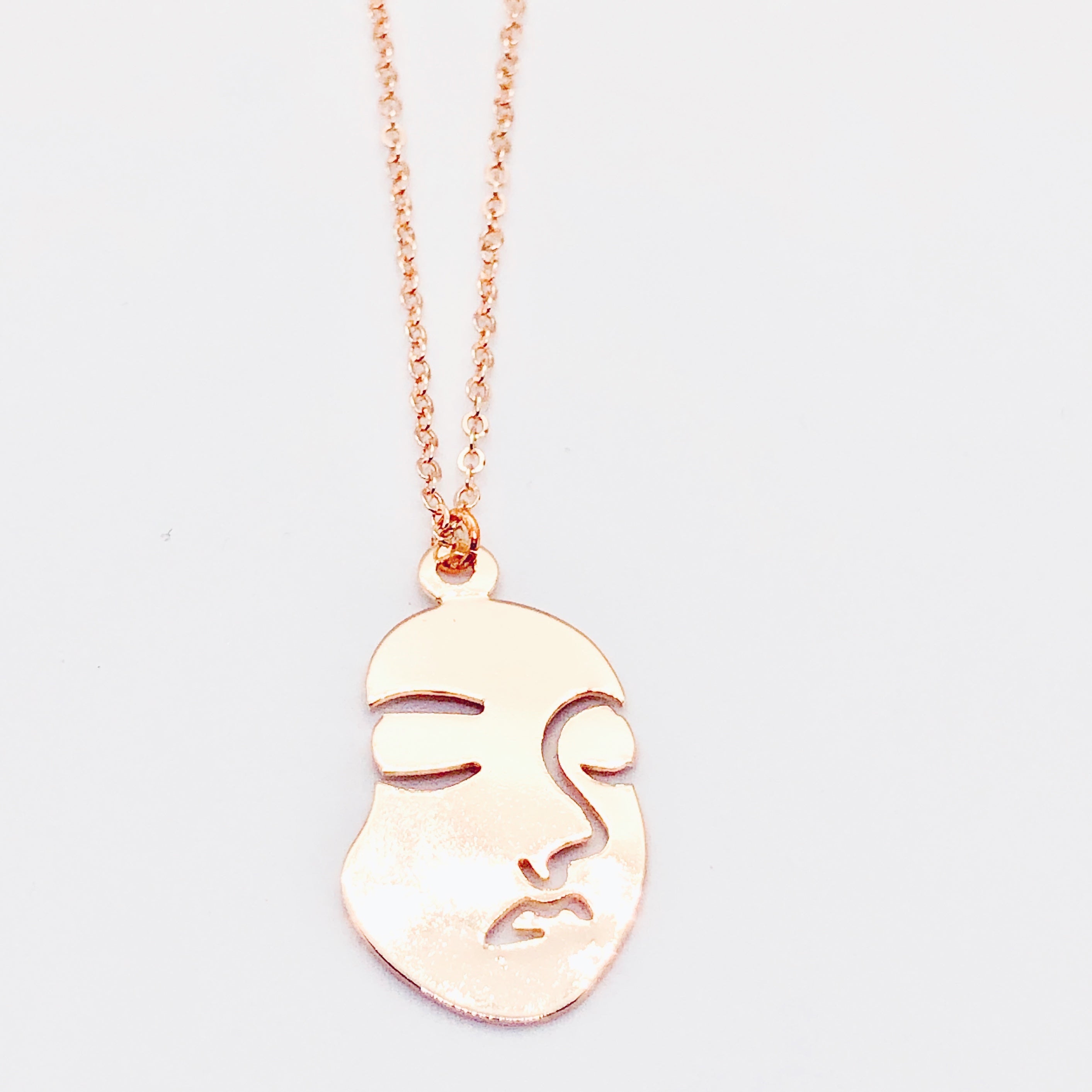Long Gold Face Necklace