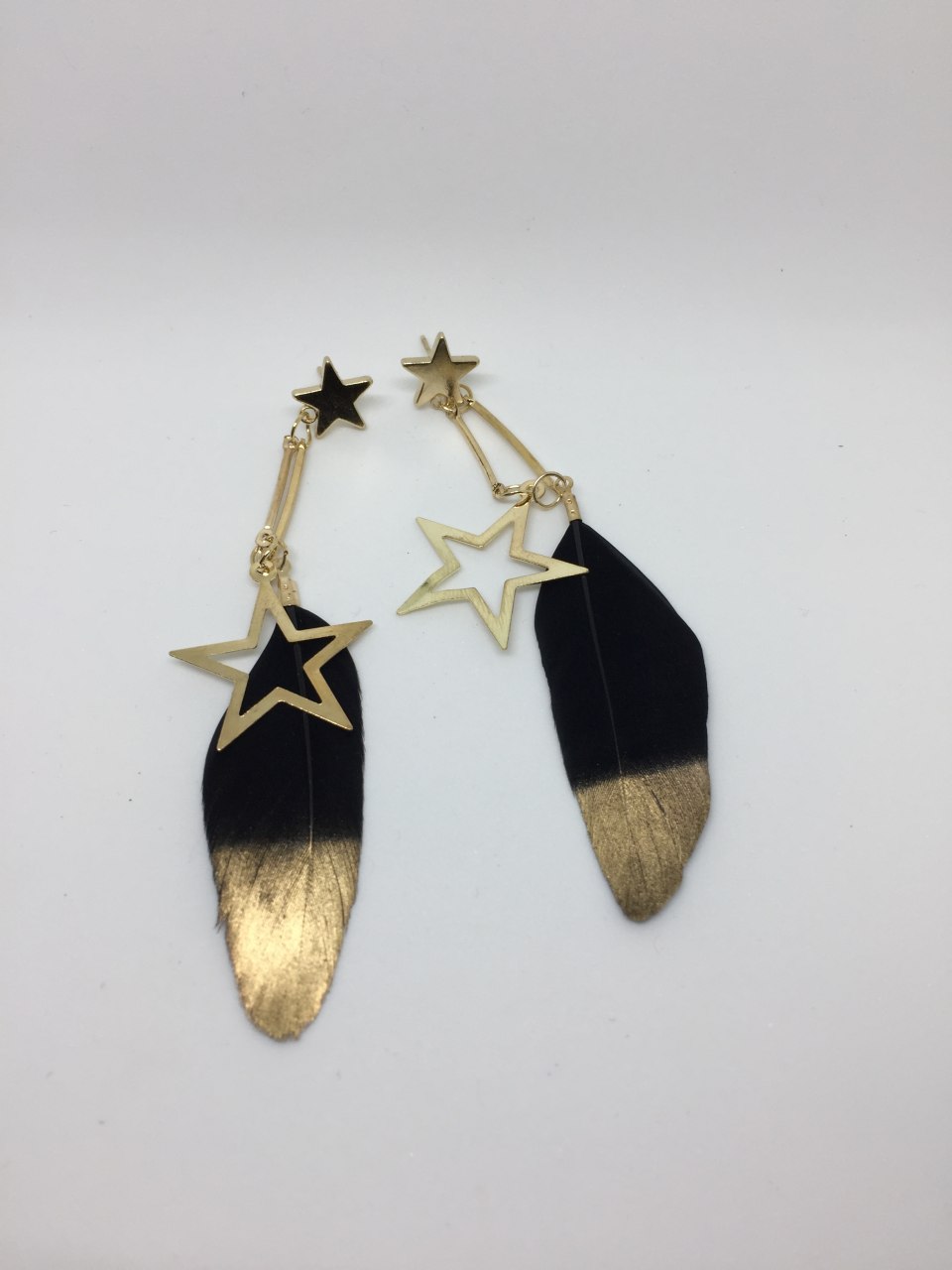 Feather star earrings