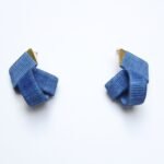 The Joy Navy Blue Earrings (Small Size) are elegant and versatile accessories designed to add a subtle yet sophisticated touch to your everyday style. Featuring a deep navy blue hue, these petite earrings capture the essence of calm, confidence, and timeless beauty. Carefully handcrafted, the earrings are lightweight and comfortable for all-day wear. Their small size makes them an ideal choice for those who prefer minimalist jewelry that still makes a refined statement. The rich navy blue color pairs effortlessly with a variety of outfits, from casual daywear to evening attire, offering a versatile accessory for any occasion. The Joy Navy Blue Earrings embody a joyful spirit and understated elegance, perfect for layering with other pieces or wearing solo for a clean, polished look. Whether you're treating yourself or gifting a loved one, these earrings make a thoughtful and stylish addition to any jewelry collection. Add a touch of serene sophistication to your ensemble with the Joy Navy Blue Earrings (Small Size), designed to celebrate individuality, grace, and artistic craftsmanship.