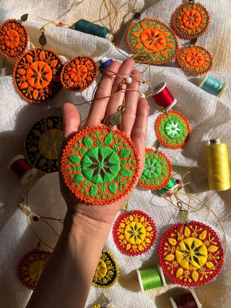 Handmade Embroidered Circular Necklace With Green and Orange Thread