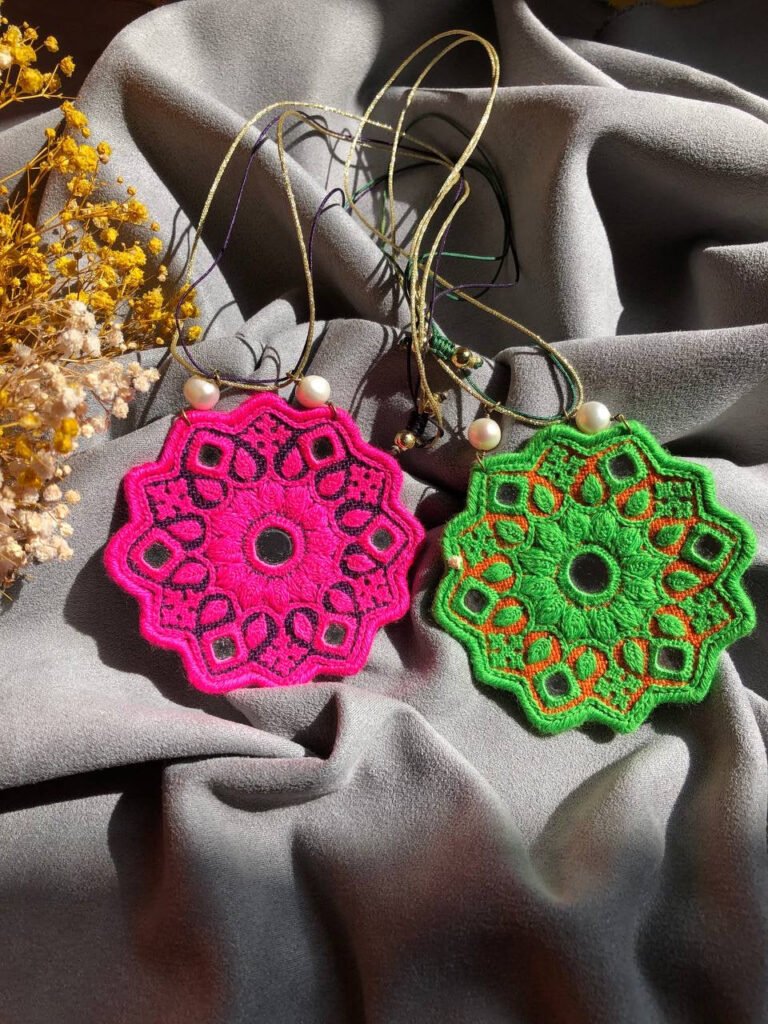 Handmade Embroidered Circular Necklace With Pink and black Thread