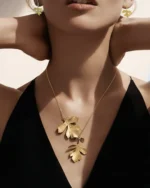 handmade necklace and earrings with two natural leaves