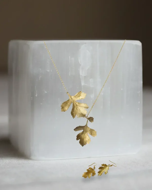 handmade necklace and earrings with two natural leaves