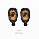 Her eyes, handmade earrings, paper mache