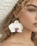 Handmade Real Orchid Earrings With Silver Hoop on model