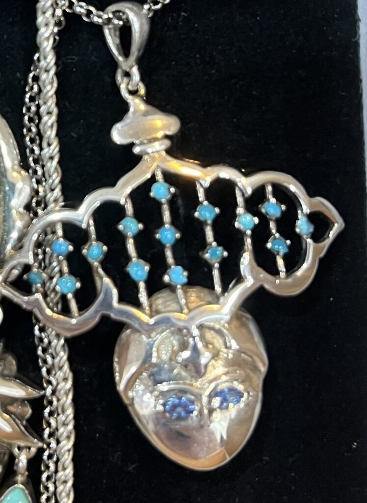 Dokhtar-e-Abri Gold Plated Silver Pendant with Turquoise and Sapphire gemstones