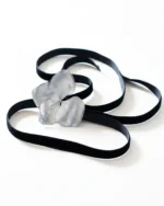 A black velvet choker featuring a silver hydrangea flower centerpiece, displayed on a white background.