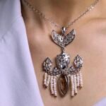 Parishid Gold Plated Silver Pendant with Pearl and Rutile and Synthetic gemstones.