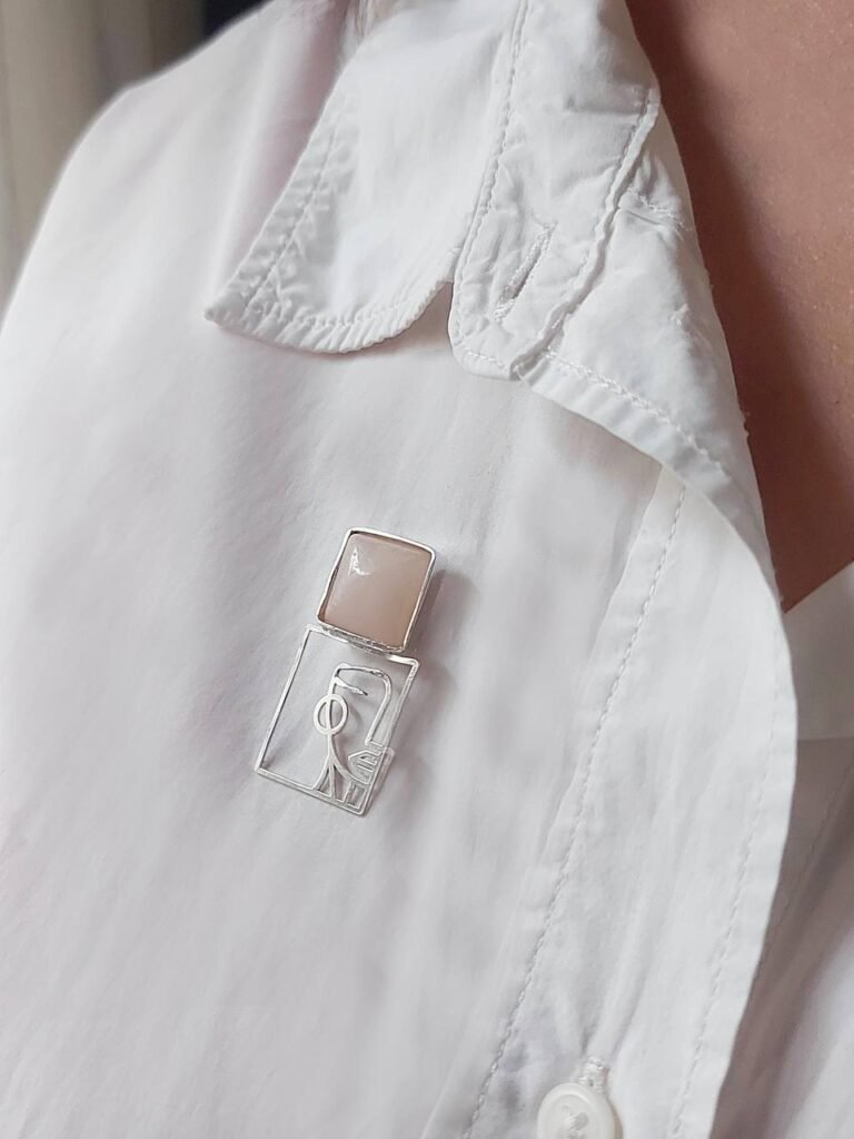 Modern Silver Brooch with Pale Zircon Accent