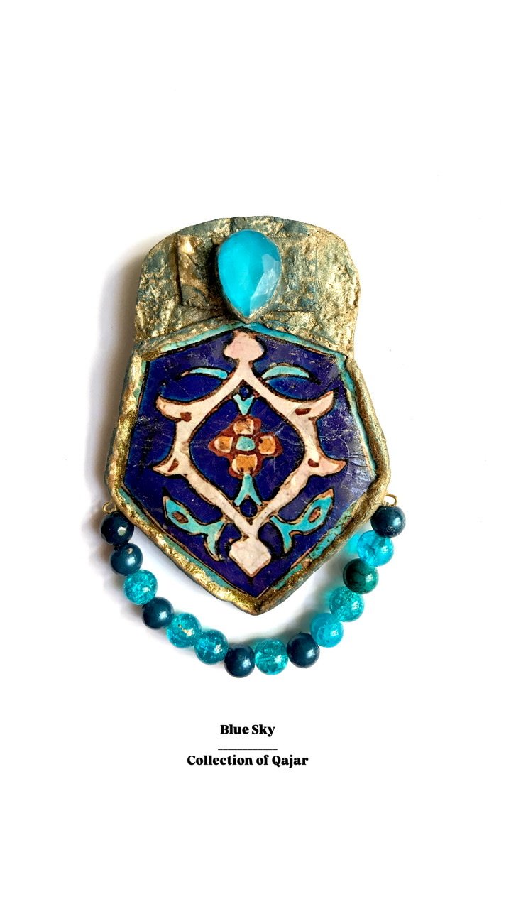 Sky blue brooch with old tiled image