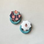 Metanat earrings paper mache light weight