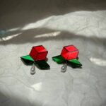 Rose – An earring inspired by the rose flower, crafted from colored mirror and pearl