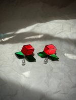 Rose – An earring inspired by the rose flower, crafted from colored mirror and pearl