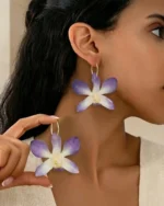 Handmade Real Orchid Earrings Covered By UV Resin On Model
