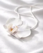 White Phalaenopsis Orchid Suede Choker Necklace On Model With Background